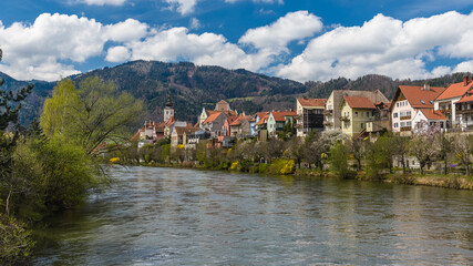 Wall Mural - Frohnleiten - small town above Mur river in Styria, Austria. View at Parish church, town and river Mur. Famous travel destination.