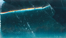 Cracked Ice Background. Broken Glass Texture. Teal Blue Scratched Surface With Frost Dust.