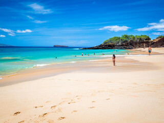 Golden sand of Big Beach in Maui Hawaii. Big Beach is also known by the names Makena Beach and Oneloa Beach, waves often big, and powerful.