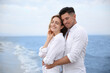 © New Africa - Happy couple on sea beach. Romantic walk