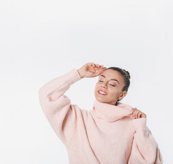 Sticker - Young woman in stylish pink sweater on white background