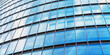 © Bonsales - background of modern office building wall with glass windows
