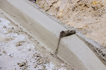 Canvas Print - Preparing to get ready to installation of the curb before reconstruction of the sidewalk and curbs.