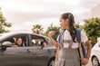 © JoseManuel - Happy family smiling on a routine morning school. School girl walks away from the car on a sunny day.