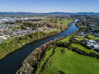 Wall Mural - Aerial view of the Waikato River looking North towards Ngaruawahia in Hamilton, New Zealand