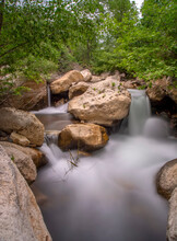 Motion Blur Waterfalls Peaceful Nature Landscape In  Mountains With Lush Green Trees,