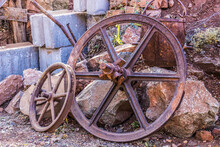 Vintage Rusty Pitted Wheels In Salvage Yard