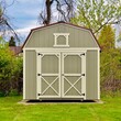American style wooded shed. A shed is typically a simple, single-story roofed structure in a back garden or on an allotment that is used for storage, hobbies, or as a workshop. Exterior view