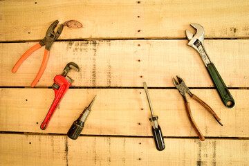 Wall Mural - Hand tools, Assorted on wood bench.