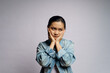 © chajamp - Asian woman thinking about problem, worried and confused emotion isolated over background.