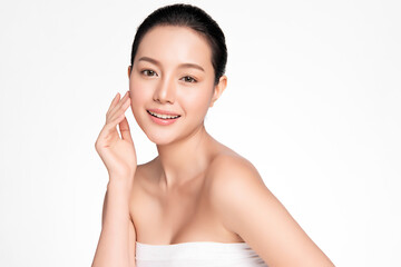 beautiful young asian woman with clean fresh skin on white background, face care, facial treatment, 