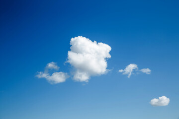 Wall Mural - white, fluffy clouds in blue sky. background from clouds