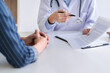 © mojo_cp - Doctor with patient in medical clinic or hospital.