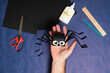DIY Halloween paper spider. Halloween craft step by step instructions. Step 14.