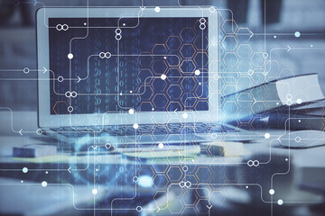 multi exposure of desktop computer and technology theme hologram. concept of software development.