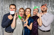 © Syda Productions - celebration, christmas and holiday concept - happy friends posing with party props