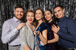 © Syda Productions - celebration, technology and holiday concept - happy friends taking picture by selfie stick at party