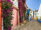 Fototapeta Uliczki - Colorful street in the medieval town of Óbidos, Portugal