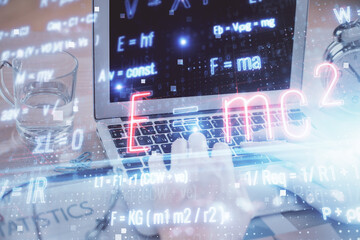 Science formula hologram with man working on computer on background. Education concept. Double exposure.