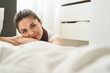 © Viacheslav Yakobchuk - Relaxed lady with long hair in her bedroom