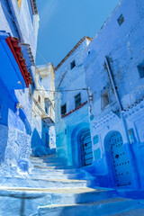 Wall Mural - Street in the blue city of Chefchaouen in Morocco