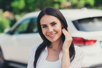 Poster - Portrait of charming nice girl car owner enjoy travel ride drive car in city center park outdoors