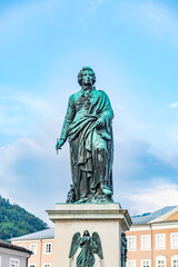 mozart monument in the mozart square, salzburg, austria