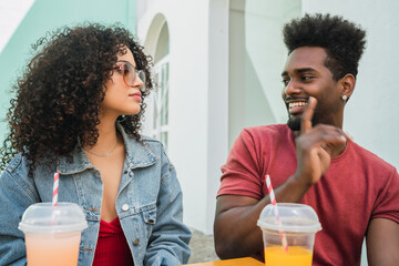 Wall Mural - Two afro friends having fun together.