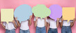 © Prostock-studio - Unrecognizabe Ladies Holding Empty Colorful Speech Bubbles Standing In Studio