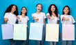 © Prostock-studio - Five Women Showing Blank Shopping Bags Standing Over Blue Background