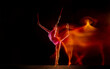 © master1305 - Bright. Young flexible girl isolated on black studio background in mixed light. Female rhythmic gymnastics artist practicing in action. Exercises for flexibility, balance. Grace in motion, sport.