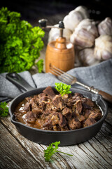 Canvas Print - Beef stew in a cast iron skillet.