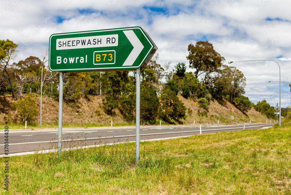 Road sign in rural NSW indicating the direction to Bowral via the ...