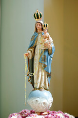 Wall Mural - Statue of the image of Our Lady of the Rosary