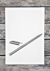 Wall Mural - Empty notepad with pen