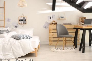 Wall Mural - Elegant interior of bedroom with workplace under stairs