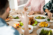 © Yakobchuk Olena - Guests sitting at the table during a festive dinner