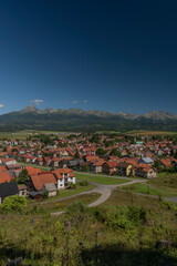 Vazec village view with Vysoke Tatry mountains in sunny summer day