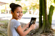 © pinzonoob - 10-13 year old girl looking at a tablet