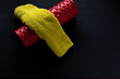 © Armando Oliveira - red roller gym and a green towels on a black home gym background