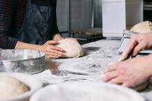 Baker Forming Bread With Hands