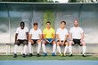 © Inuk Studio/Stocksy - team of players talking after the game