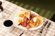 © 365mm/Stocksy - Delicious classic breakfast on table