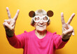 © Raisa Kanareva - grandmother wearing pink sweater and big sunglasses over yellow background.