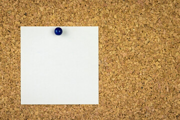 empty (place for text) square sheet of paper attached to a cork board, workspace, mock up