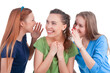 © danmorgan12 - Three Young Funny Caucasian Girlfriends Sharing Their Secrets Whispering to Ears.Isolated Over White Background.