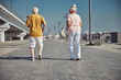 © Viacheslav Yakobchuk - Active senior people working out on the quay