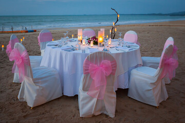 Wall Mural - Set the table for dinner on the beach.