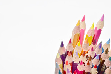 Colored sharpener pencils. Macro shot of many color pencils. Selective Focus.