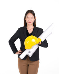 Young asian businesswoman in a black suit holding a yellow construction hat and the construction drawings.